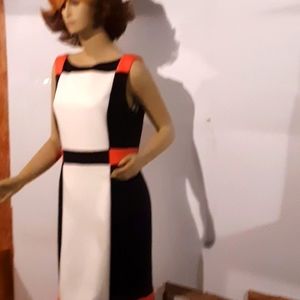Women's dress orange black and White.